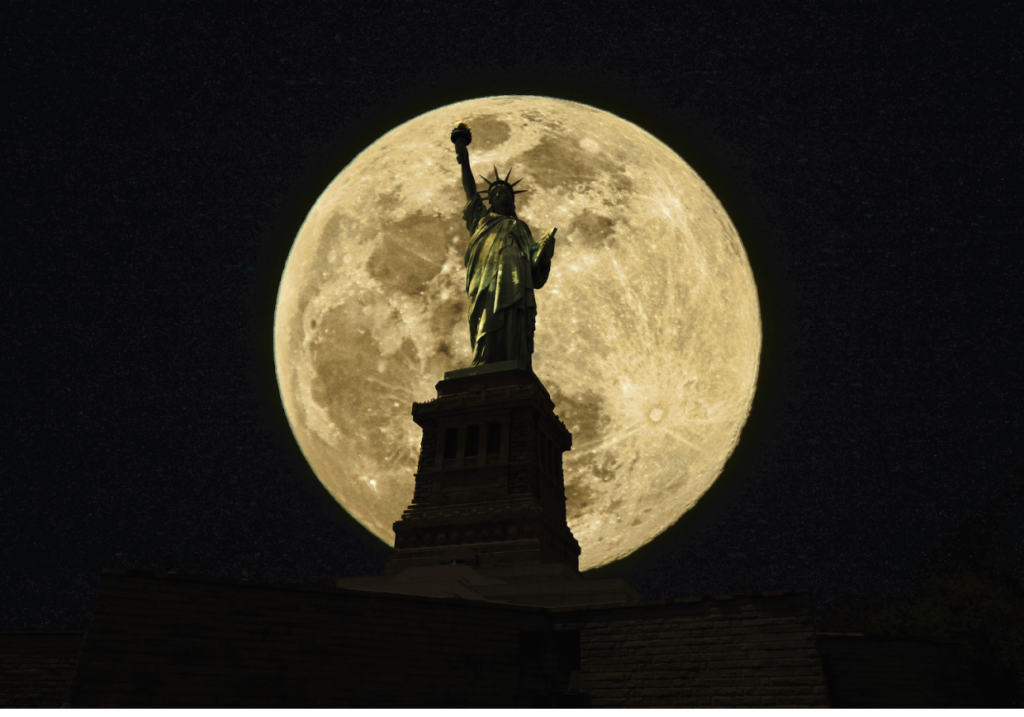 Statue of Liberty against full moon. 